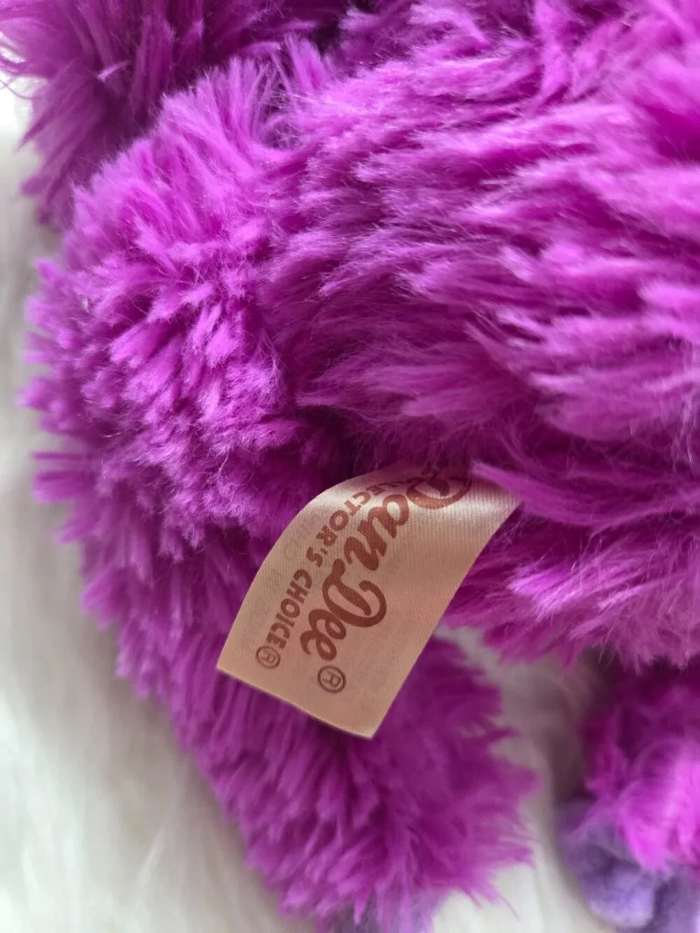 Purple Stuffed Sloth Toy
